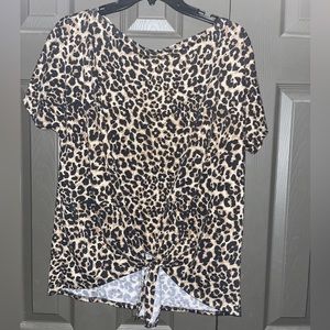 Cheetah print top, fits loose ties in front, can be worn off shoulder.